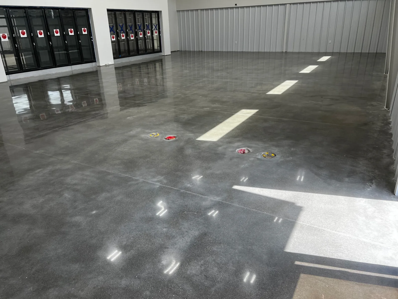 Polished concrete floor with high-gloss sealed finish